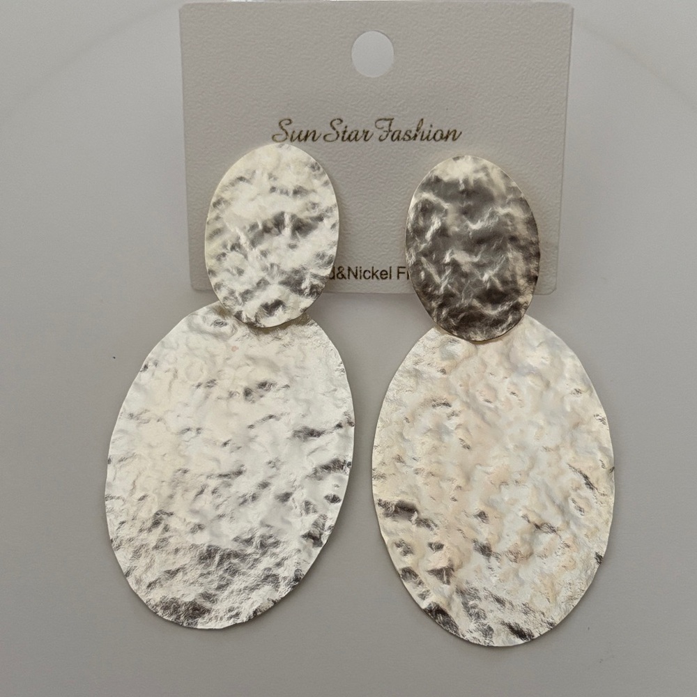 Beautiful silver-tone metal hammered disc dangle stud earrings.